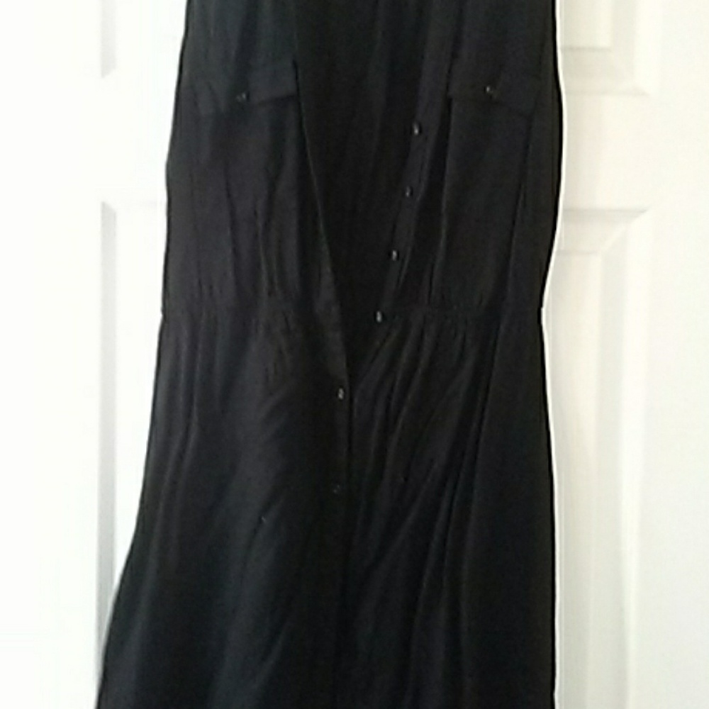 Black sleeveless mini button up dress